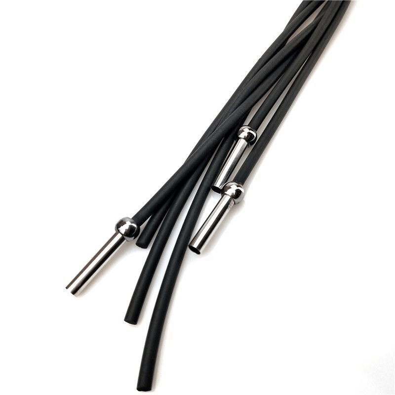 Close-up of black rubber accessories with silver ends, perfect for stylish bracelet designs and handmade jewelry.