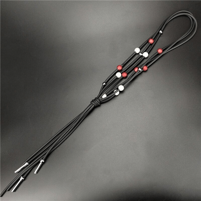 Elegant red and white pearls long necklace on rubber, perfect for casual luxury jewelry styles.