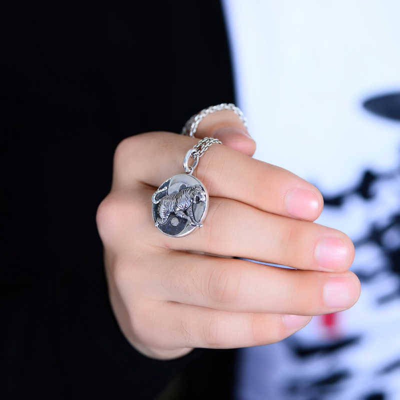 Unisex sterling silver pendant featuring intricate designs of four mythical beasts, perfect for retro style outfits.