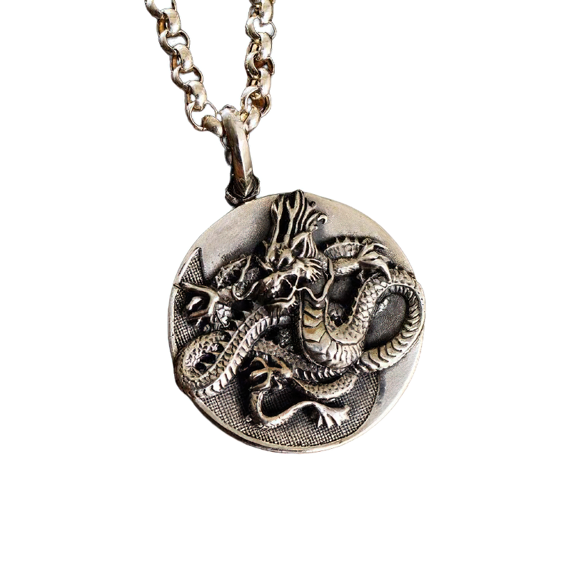 Unisex sterling silver pendant featuring a detailed dragon design, perfect for retro style accessories.