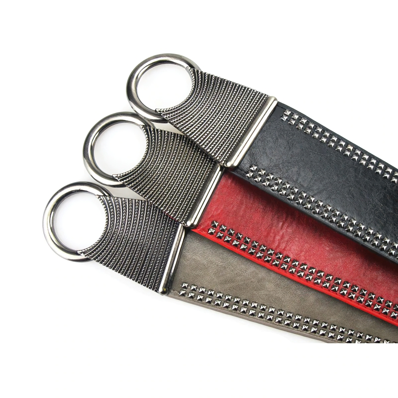 Wide women's belts with round metal buckles and rivets in various colors - rock style accessory.