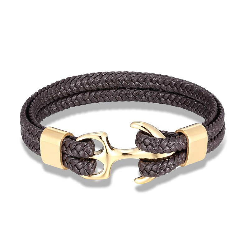 Fashionable unisex rope bracelet with gold stainless steel anchor and braided leather, perfect casual accessory for any outfit.