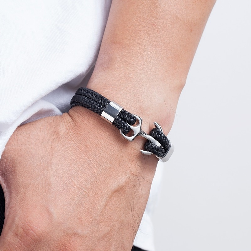 Stylish unisex fashion rope bracelet with stainless steel anchor, perfect for casual outfits in black.