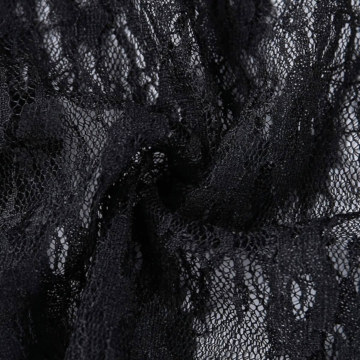 Close-up of premium black lace fabric showcasing intricate patterns for gothic style crop top.