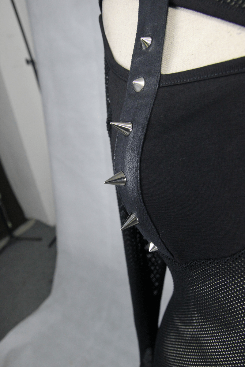 Close-up of a black mesh top featuring edgy spikes along the sides, showcasing gothic fashion style.