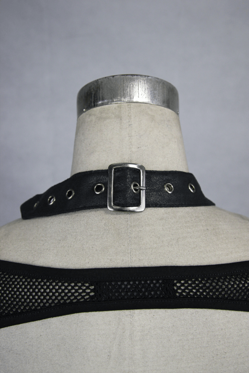 Close-up of a black mesh top with a spiked PU leather collar on a mannequin, showcasing gothic fashion details.