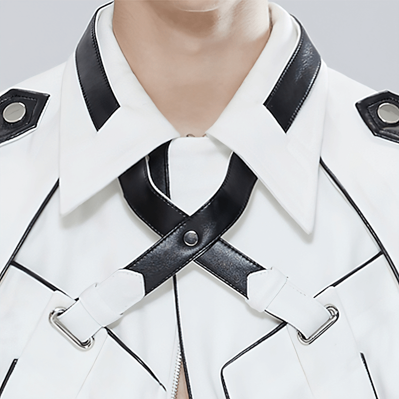 Close-up of a stylish men's patchwork leather jacket collar with black detailing and silver hardware.