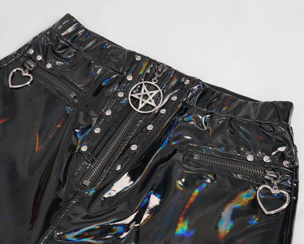 Close-up of women's slim PU leather pants featuring zippers and unique heart details, perfect for a stylish look.