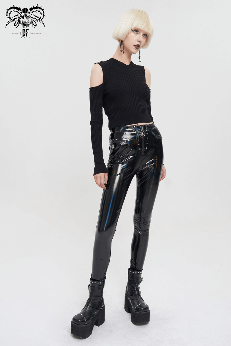 Fashionable woman in black off-shoulder top and shiny slim PU leather pants, showcasing a bold casual style.