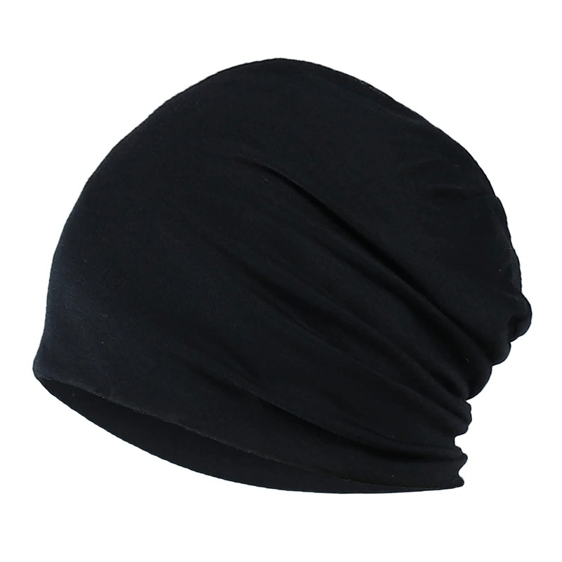 Fashion solid black stretch beanie hat made of soft warm cotton, perfect unisex casual accessory for all seasons.