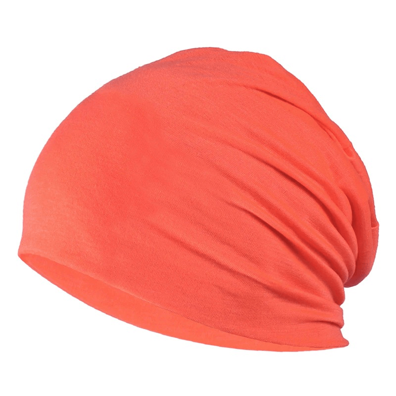 Fashion solid stretch beanie hat in vibrant orange, made of soft cotton, perfect unisex accessory for casual looks.
