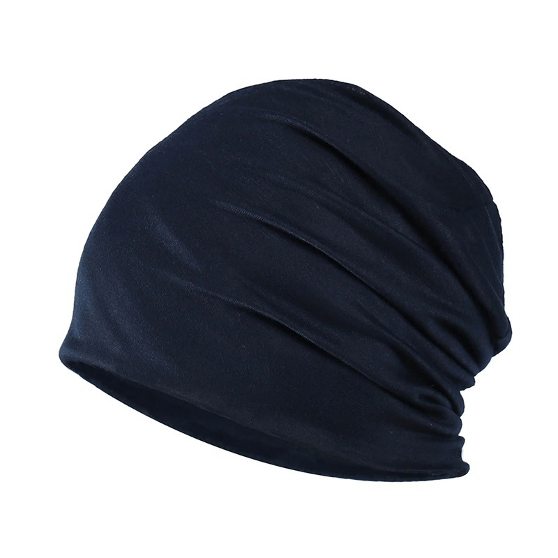 Fashion solid stretch beanie hat in dark navy, made of soft cotton for men and women, ideal casual accessory.