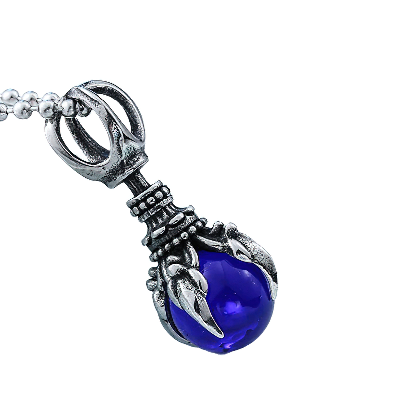 Unisex stainless steel claw pendant holding a blue stone, perfect for alternative fashion lovers.
