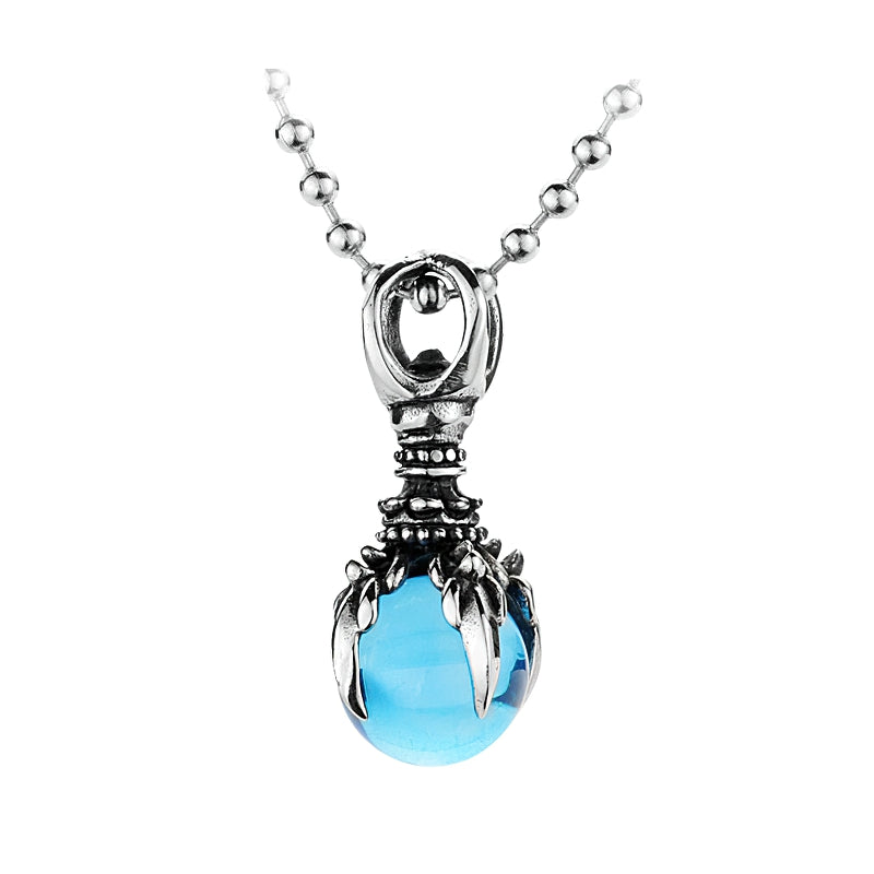 Unisex stainless steel pendant with blue stone in claw design, stylish alternative fashion accessory.
