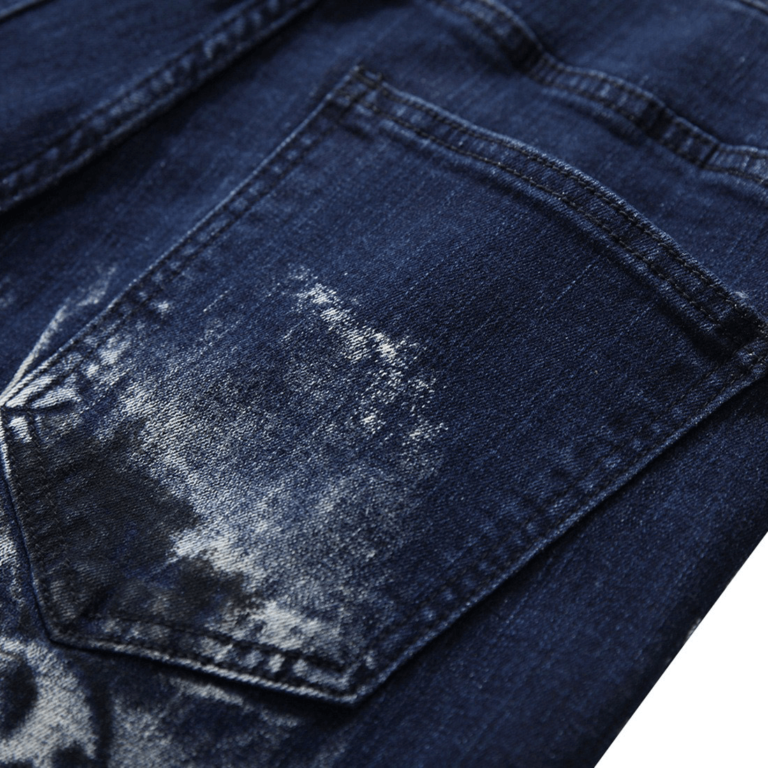 Close-up of the back pocket of fashion straight jeans with distressed detailing, perfect for punk style outfits.