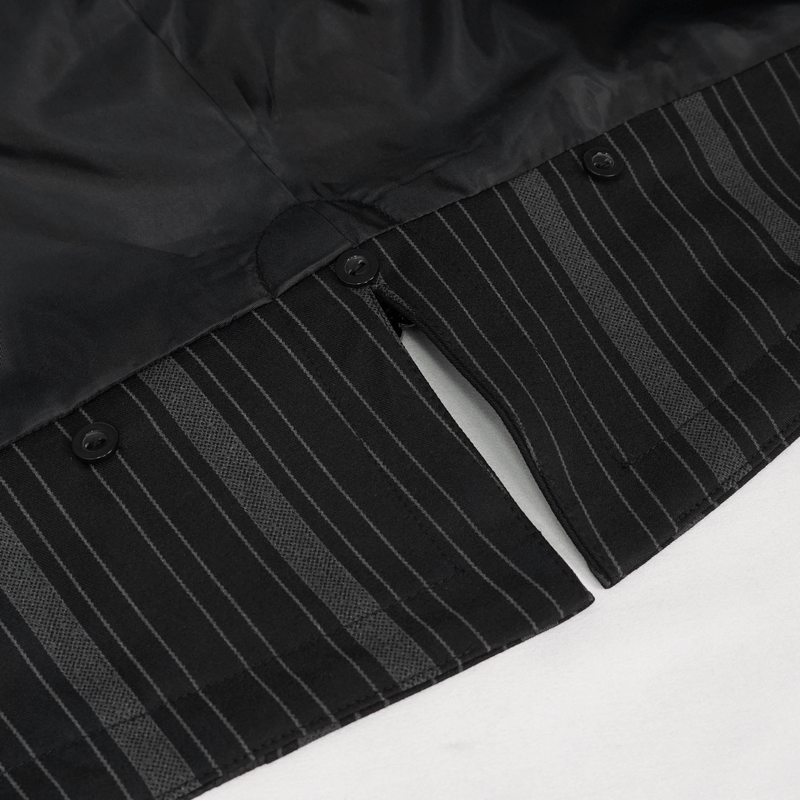 Close-up of black waistcoat with detachable swallowtail and patterned buttons for a gothic look.