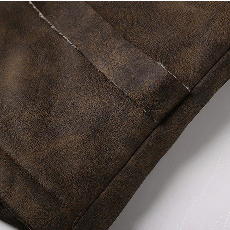 Close-up of high-quality suede fabric showcasing texture for a men's steampunk vest, perfect for stylish outfits.