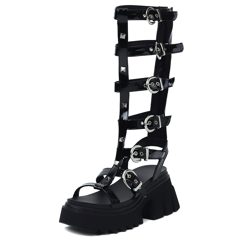Black gladiator high platform sandals with shiny straps and metal buckles, perfect for summer fashion styles.