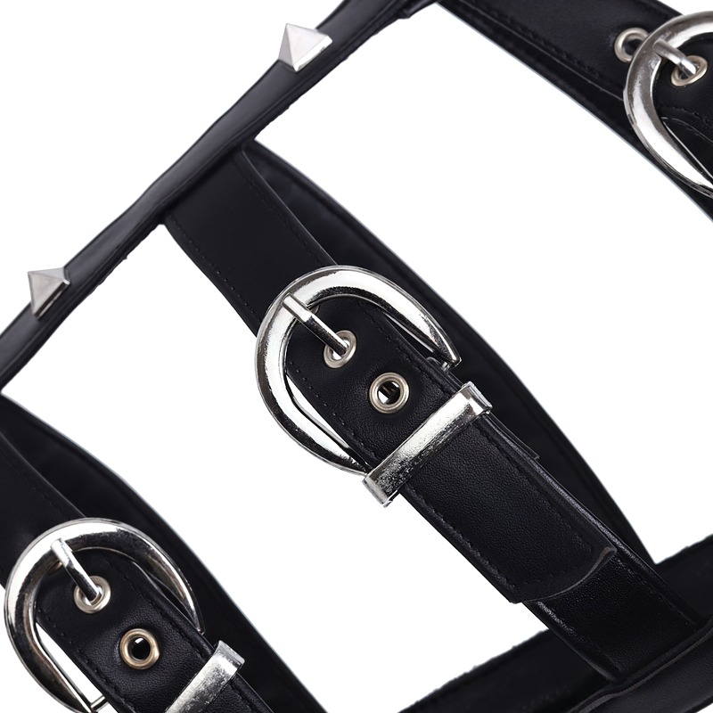 Close-up of black gladiator sandal straps with silver buckles and studs, showcasing edgy summer fashion details.