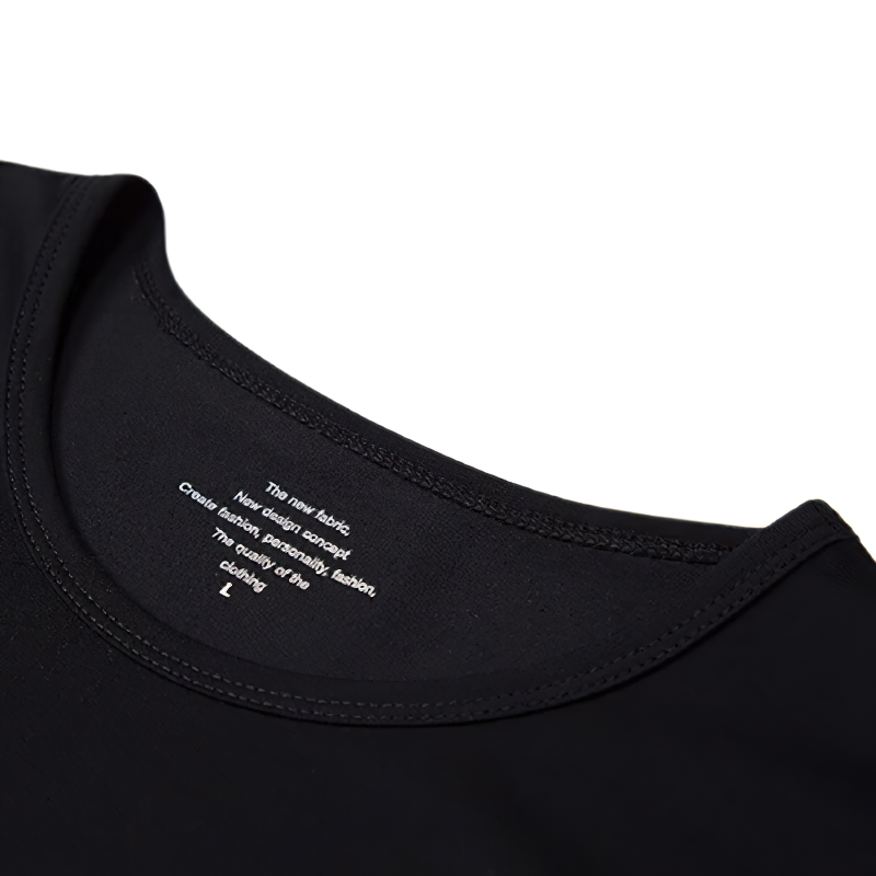 Close-up of a black t-shirt's neckline showcasing the fabric label and quality details.