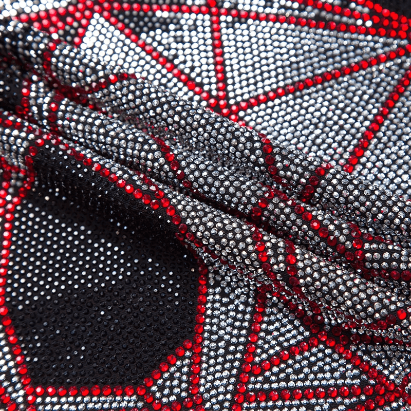 Close-up of rhinestone embellishments in a stylish pattern on a casual t-shirt, perfect for alternative fashion lovers.