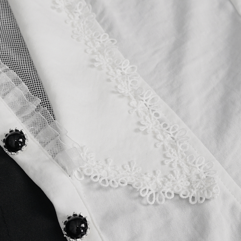 Close-up of white halter blouse with lace detail, showcasing elegant embroidery and stylish button accents.