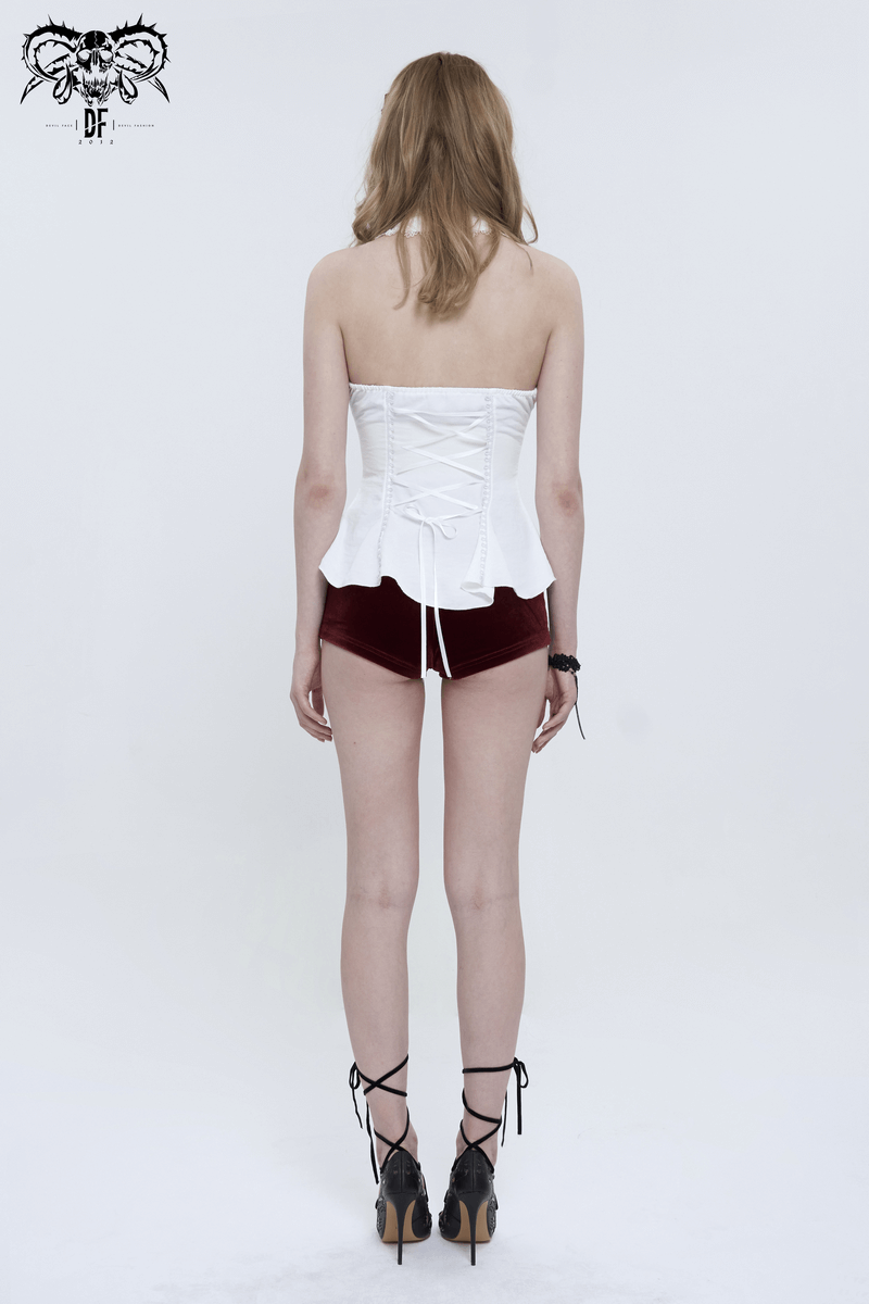Back view of a woman in a white sleeveless halter blouse with lace-up design, showcasing a sexy gothic style.