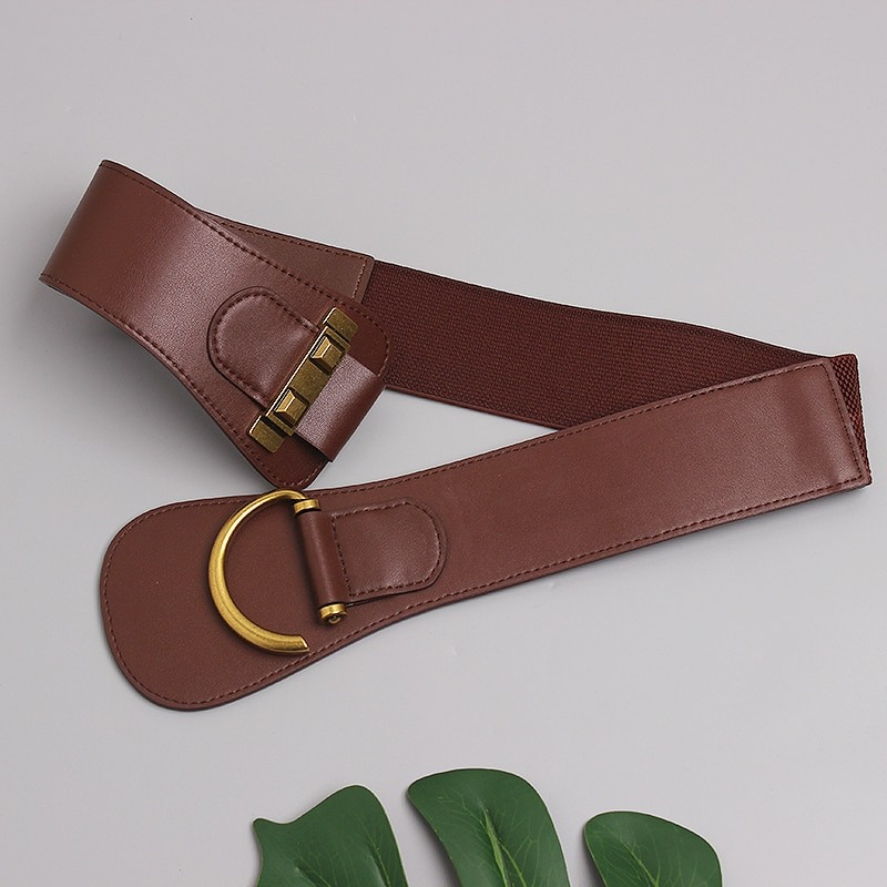 Fashion wide genuine leather belt for women with gold buckle, perfect for styling and emphasizing waist.