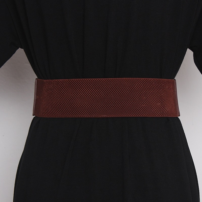 Fashion wide leather belt for women, featuring a chic design, perfect for accentuating the waist with style.