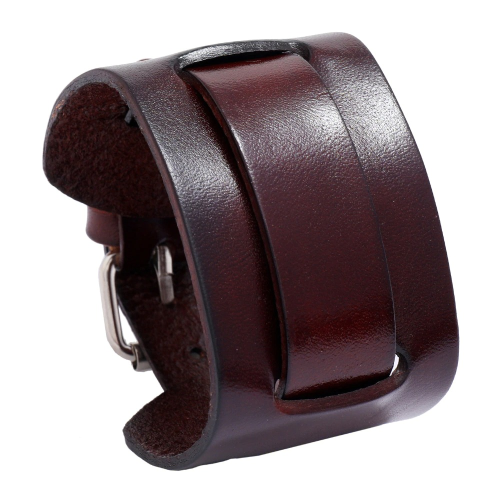 Wide genuine leather bracelet in dark brown, adjustable cuff for trendy vintage style.