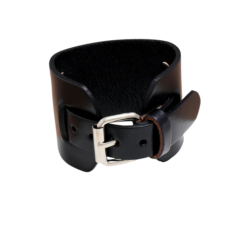 Wide genuine leather bracelet in brown and black, featuring adjustable cuff design and vintage style.