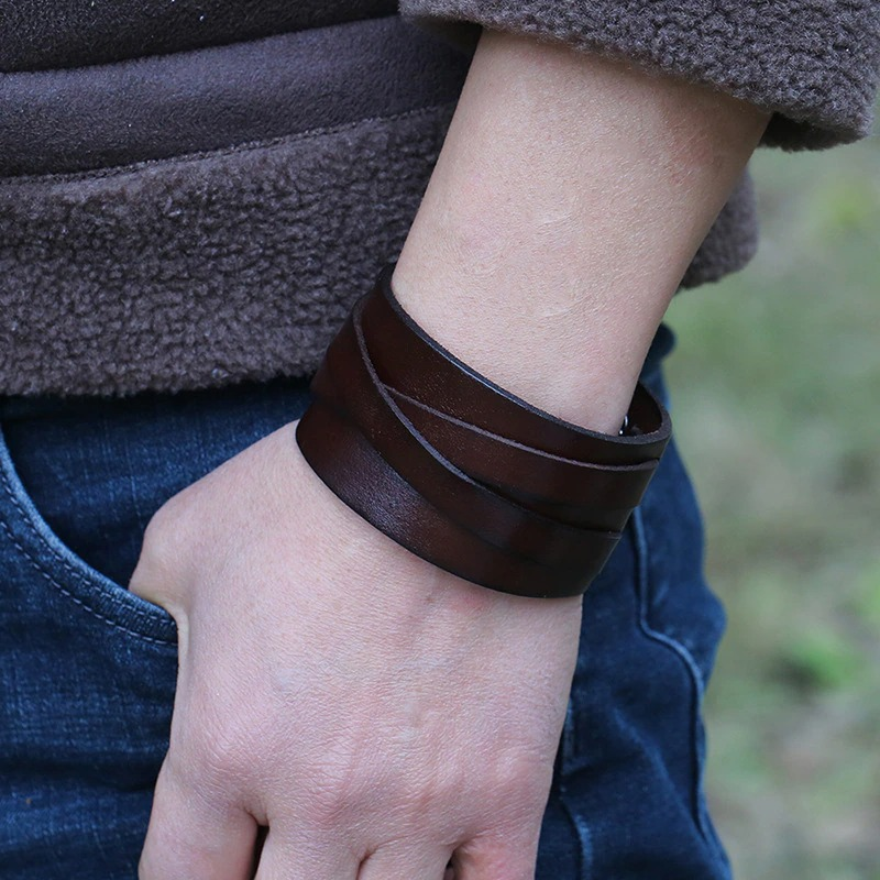 Wide leather bracelet in rich brown, unisex punk style accessory for men and women.