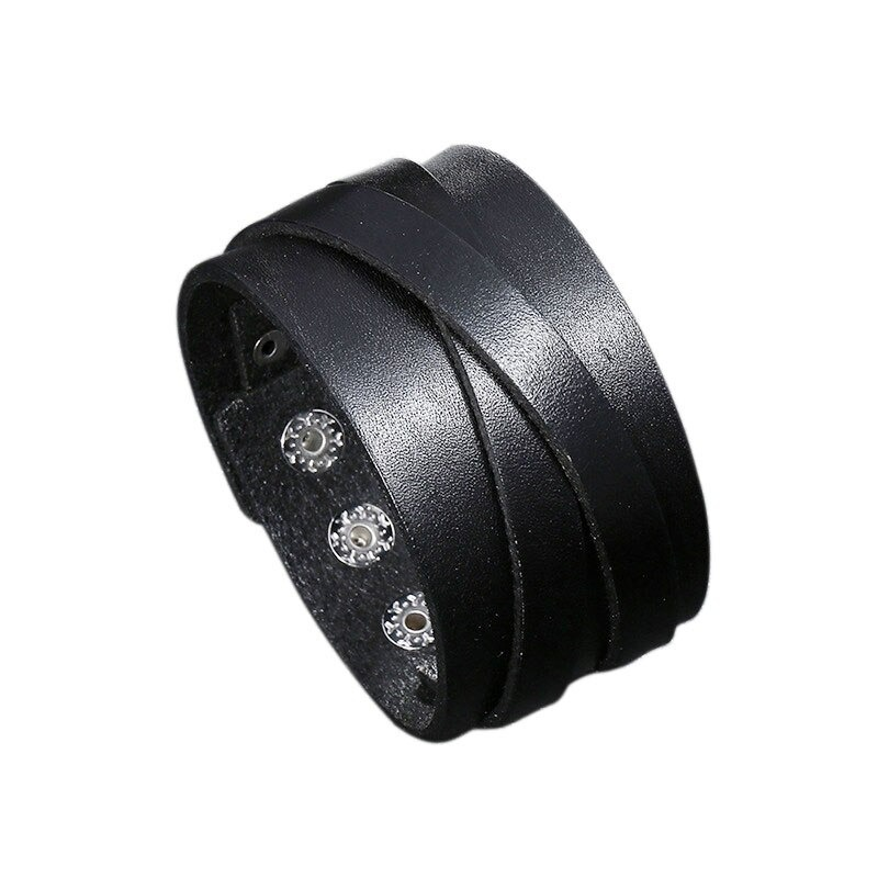 Wide leather bracelet in black with punk style design, suitable for men and women, perfect accessory for any outfit.