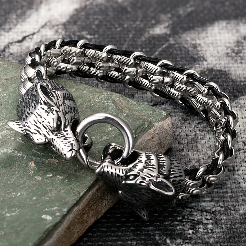 Punk rock style silver bracelet featuring wolf heads and a unique lock design, perfect for trendy outfits.