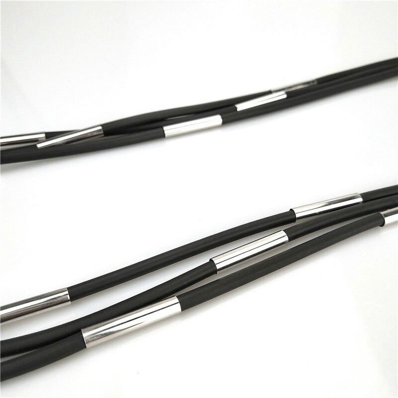 Close-up of a stylish handmade black rubber necklace with silver accents, perfect for gothic fashion enthusiasts.