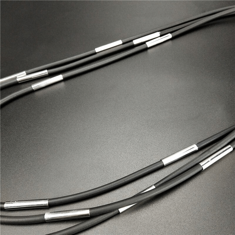 Handmade black rubber necklace with silver accents, perfect gothic accessory for women.