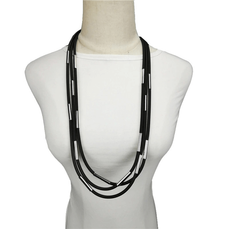 Stylish handmade black rubber necklace, perfect accessory for gothic outfits, featuring unique design and quality materials.