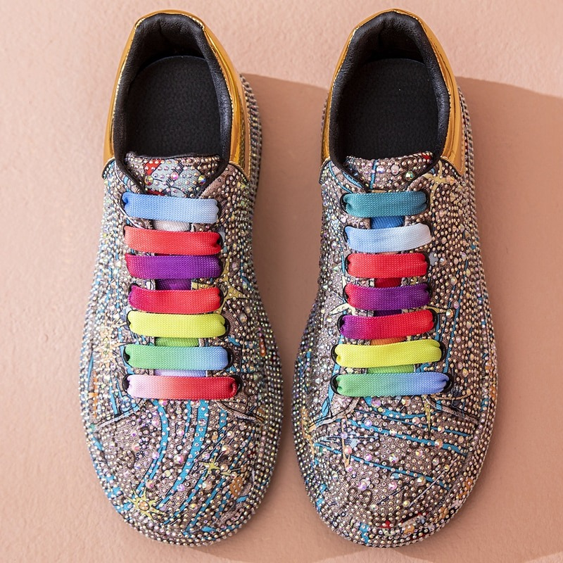Fashion women's platform sneakers featuring colorful shiny designs and rhinestone details for a standout look.