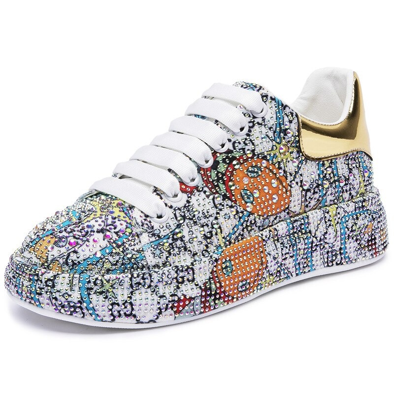 Shiny women's platform sneakers with rhinestones and colorful design, perfect for a fashionable look.