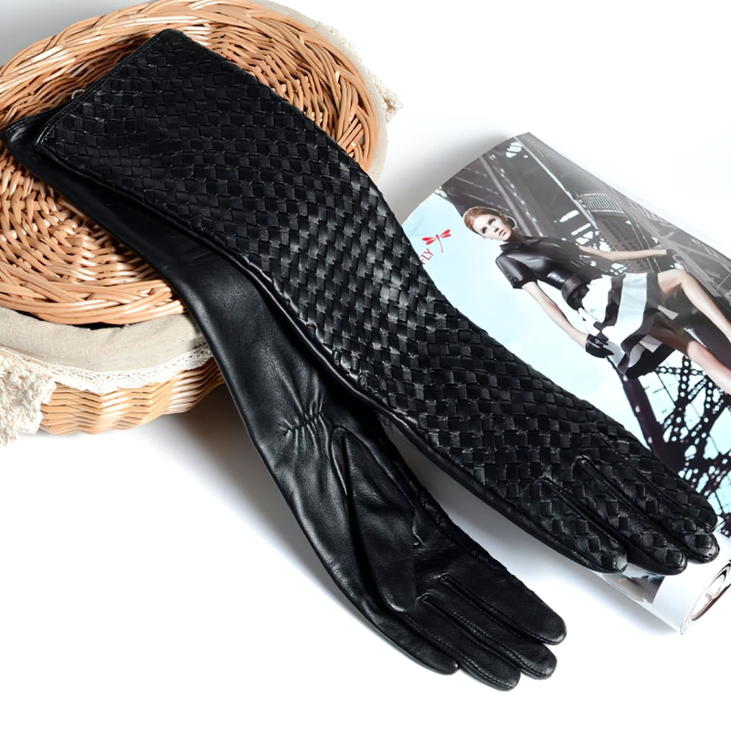 Luxurious women's black leather long gloves with hand-woven texture, perfect for Gothic fashion and stylish winter outfits.