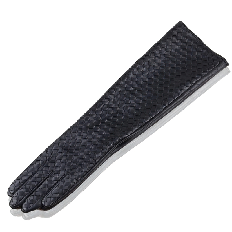 Long black leather gloves featuring a hand-woven design, perfect for gothic fashion and stylish winter outfits.
