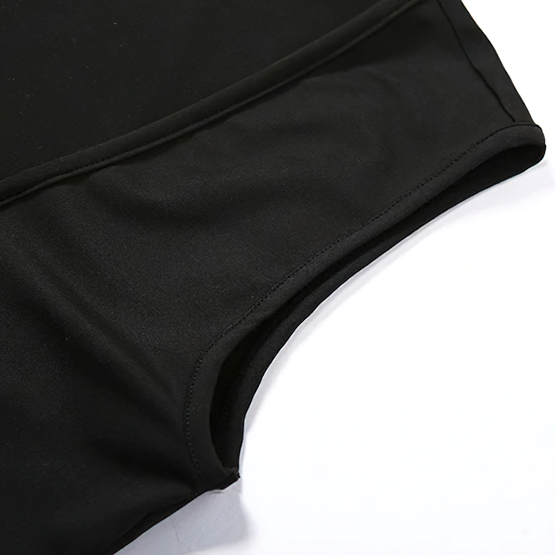 Close-up of the fabric texture and neckline of a women's black sleeveless jumpsuit, highlighting its sleek style.