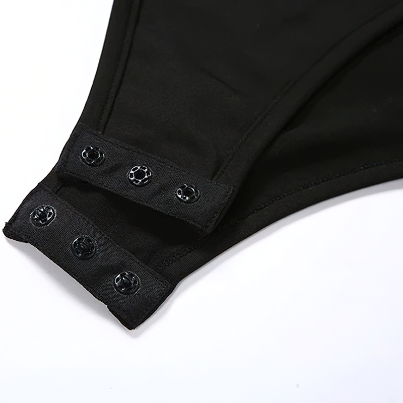 Close-up of the black sleeveless jumpsuit featuring stylish button details on the edge, highlighting its quality design.