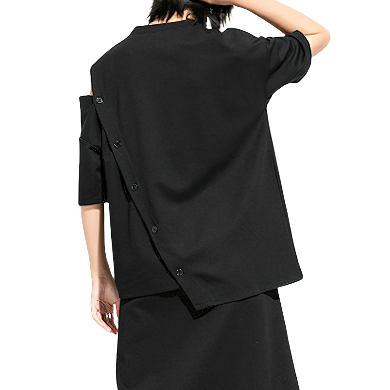 Back view of a trendy women's black T-shirt with buttons, featuring a unique asymmetrical design and half sleeves.