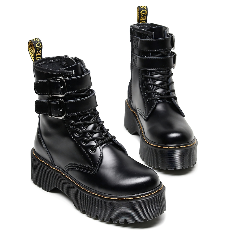 Stylish women's black PU leather boots with buckle belts and zippers for casual comfort.