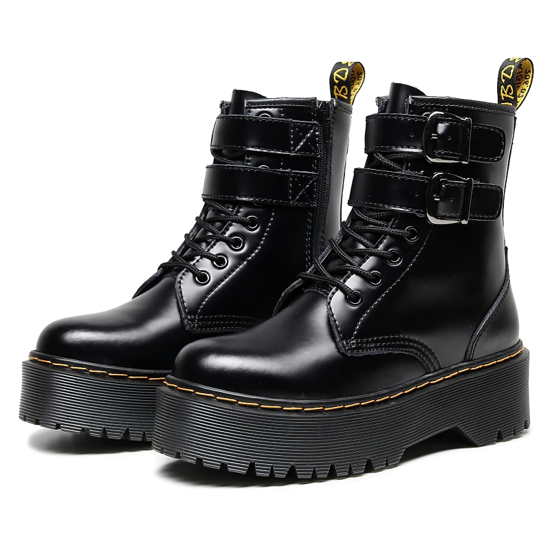 Stylish women's black PU leather boots with buckle belts and laces, perfect for casual outfits.