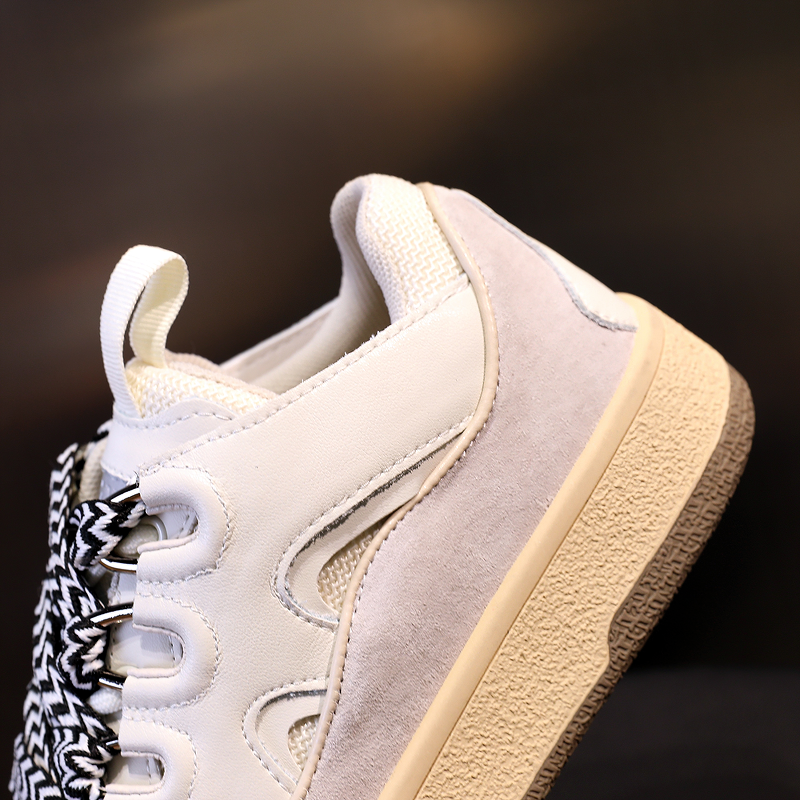 Fashion women's chunky platform sneaker featuring retro design and mixed colors, crafted from genuine leather.