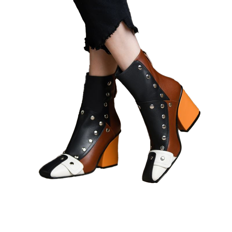 Trendy women's genuine leather ankle boots with rivets and high heels in multicolour design.