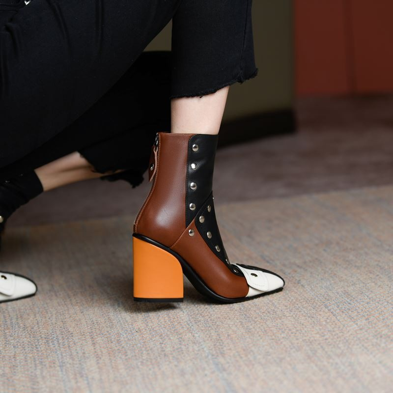 Trendy women's genuine leather ankle boots with rivets, high heels, multicolour design and stylish fur option.