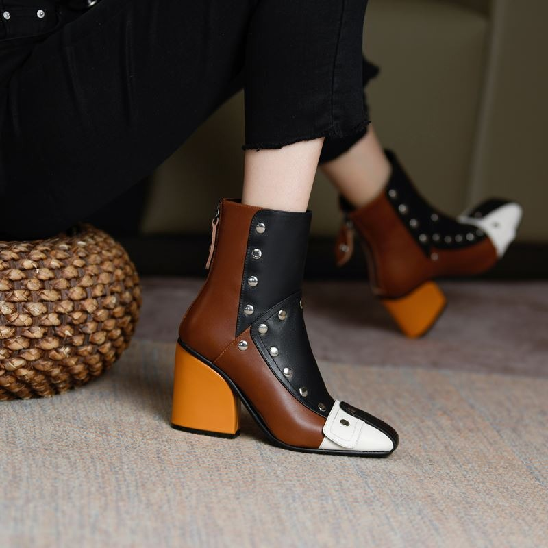 Stylish women's genuine leather ankle boots in multicolour design with high heels and rivets, perfect for casual wear.